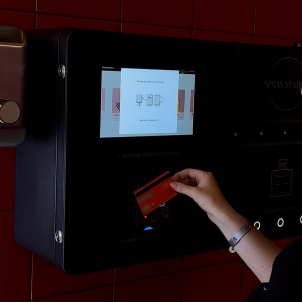 luxury Panthe perfume vending machine with touchscreen interface and premium commercial design